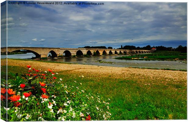 Medieval bridge at Beaugency Canvas Print by Louise Heusinkveld