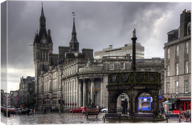 The Castlegate in the driving rain Canvas Print by Tom Gomez