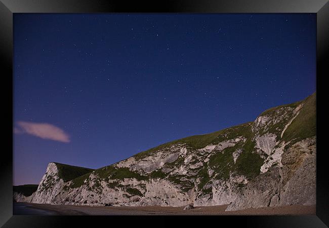 Starry night at Durdle Door Framed Print by Ian Middleton