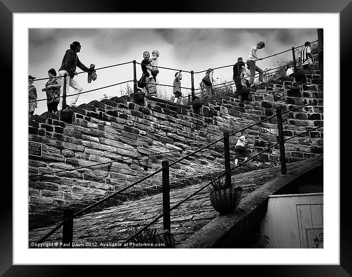 Climbing Whitby Abbey steps Framed Mounted Print by Paul Davis