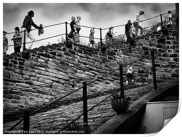 Climbing Whitby Abbey steps Print by Paul Davis