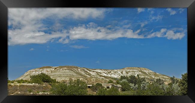 Grey clouds over Cappadocia Plateau Framed Print by Arfabita  
