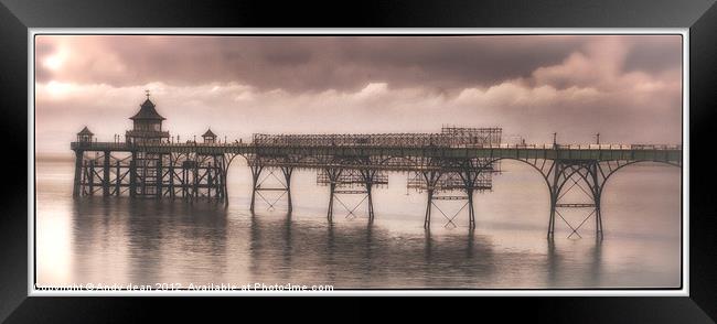 Mist by the pier Framed Print by Andy dean