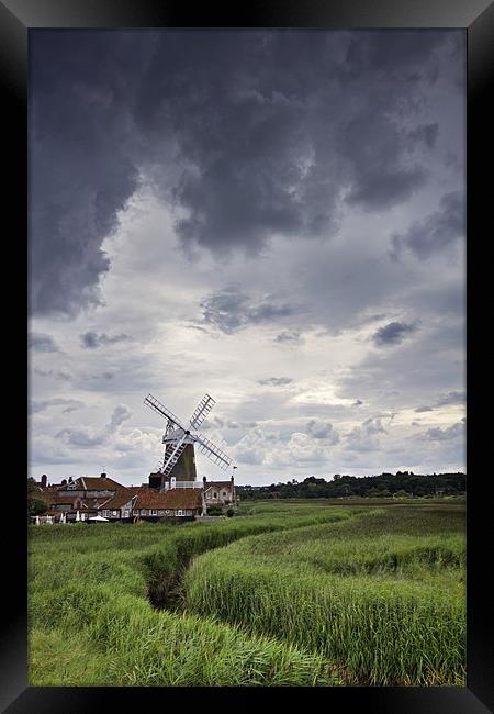 Moody Skies over Cley Windmill Framed Print by Paul Macro