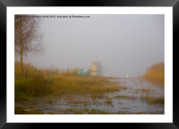 Boat and swans in mist Framed Mounted Print by Kathleen Smith (kbhsphoto)
