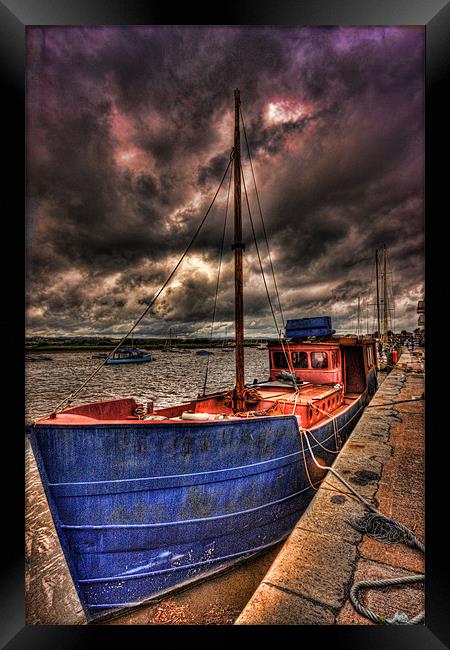 Old Boat in a storm Framed Print by Dean Messenger