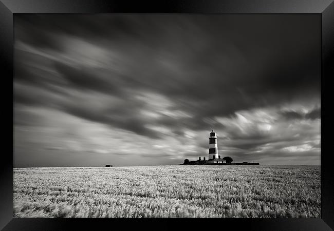 Stormy Skies Framed Print by Simon Wrigglesworth