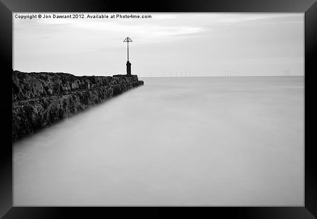 Long exposure of the the sea by a groyne Framed Print by Jonny Essex