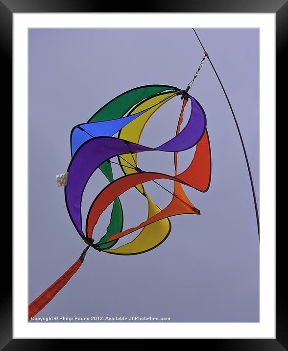 Colourful kite in the sky Framed Mounted Print by Philip Pound