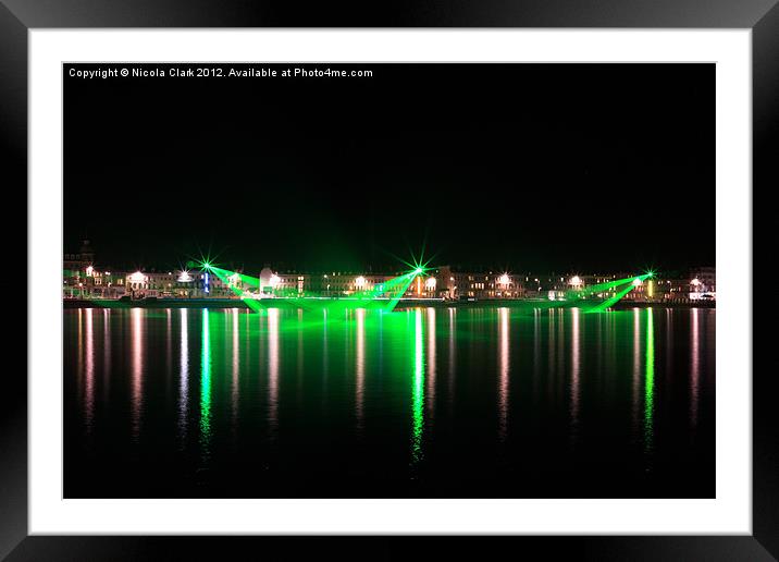Weymouth Seafront Lasers Framed Mounted Print by Nicola Clark