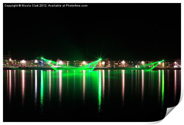 Weymouth Seafront Lasers Print by Nicola Clark