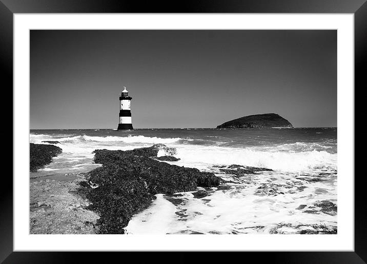 Lighthouse On The Waves Framed Mounted Print by Amber Osburn