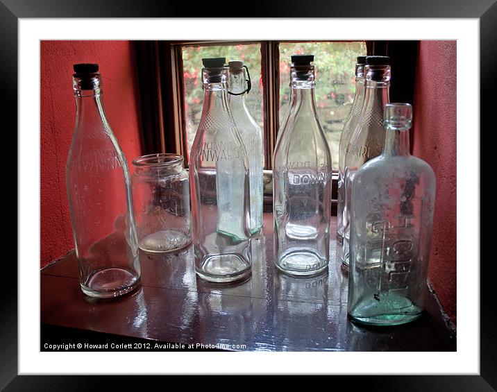 Vintage bottles Framed Mounted Print by Howard Corlett