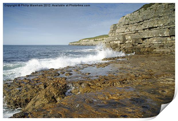 Wave on the rocks Print by Phil Wareham