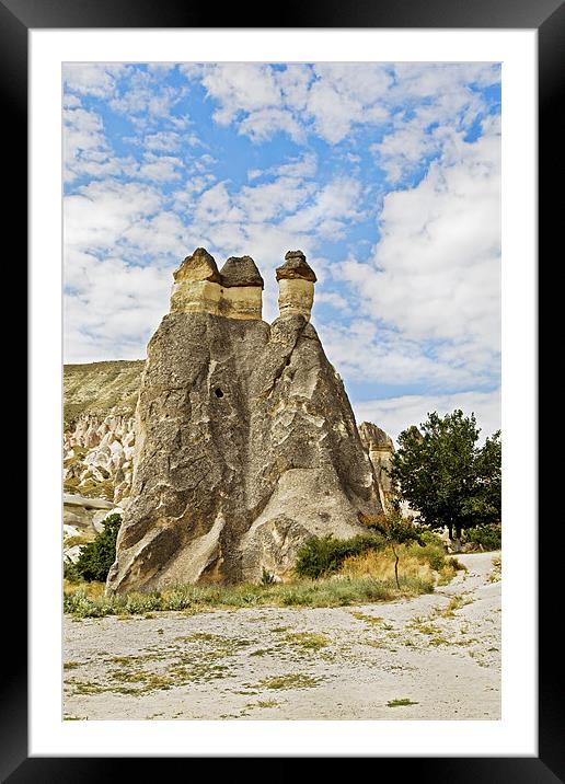 Three majestic limestone fairy chimneys Framed Mounted Print by Arfabita  