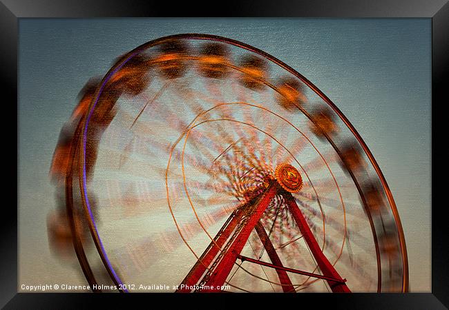 Ferris Wheel in Motion VI Framed Print by Clarence Holmes