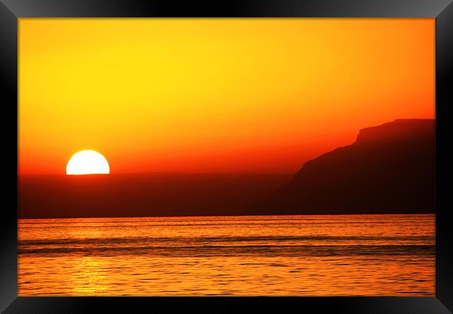 Omani sunset Framed Print by Paul Hutchings 