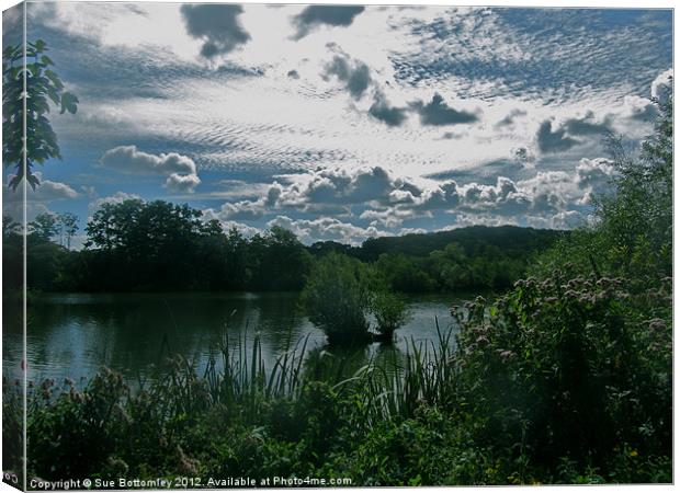 Clouds over stockers lake Canvas Print by Sue Bottomley