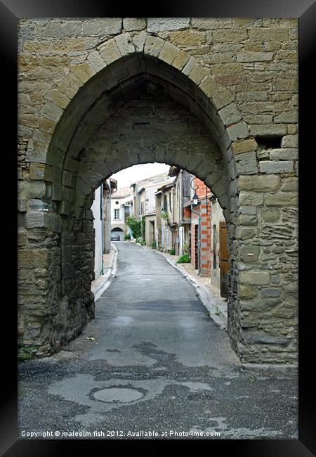 The East Gate into Saint-Papoul. Framed Print by malcolm fish