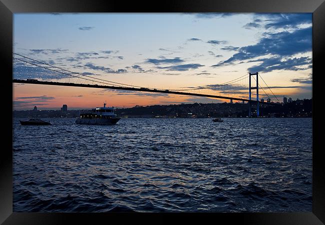 Sundown over Bosphorus and Bogazici Istanbul Framed Print by Arfabita  