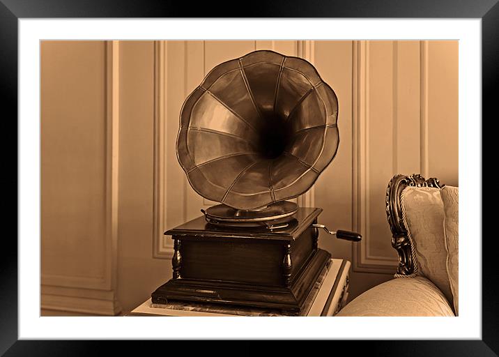 Old antique gramophone in room setting Framed Mounted Print by Arfabita  