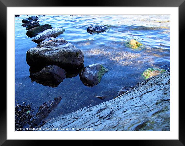 Rocks in Lake Framed Mounted Print by Stephen Conroy