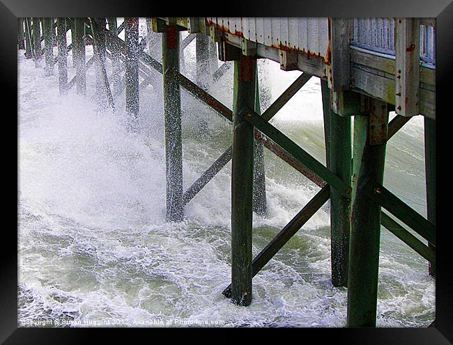 Sideswipped Pier Framed Print by Susan Medeiros