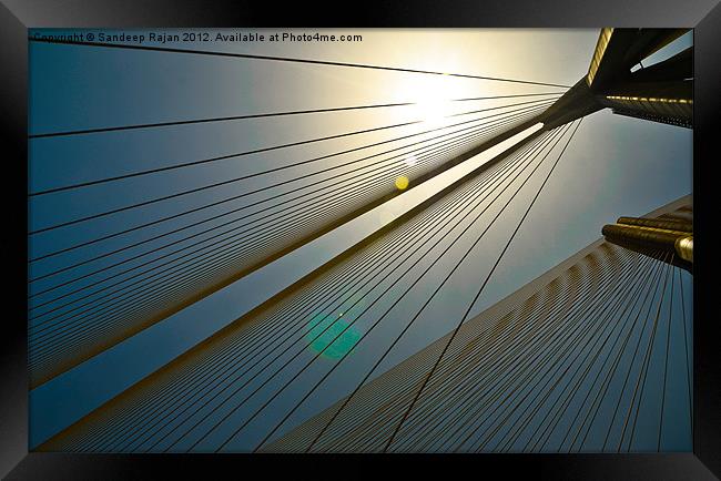 Gleam of the cables Framed Print by Sandeep Rajan