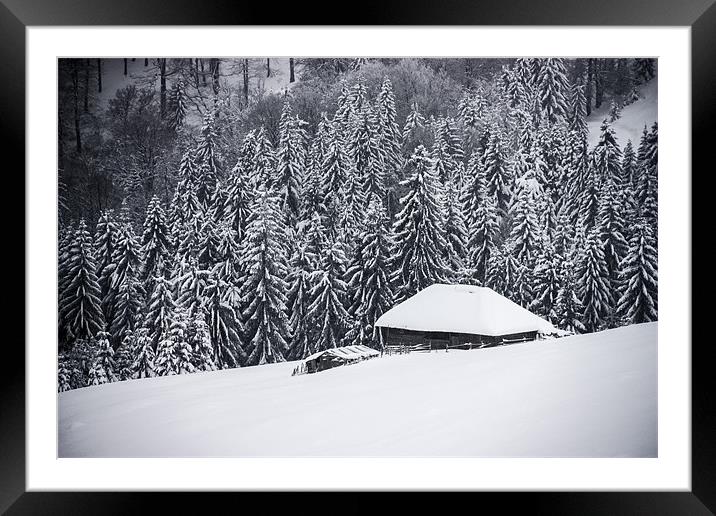 Wooden house in the snow Framed Mounted Print by Cristian Mihaila