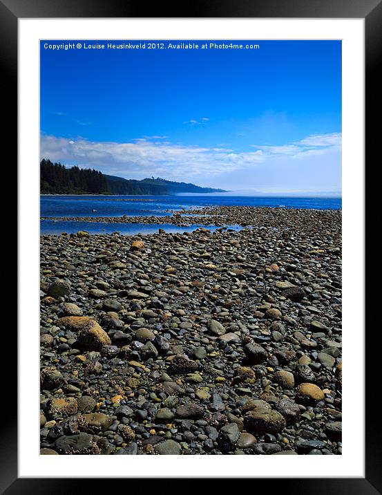 Pebble beach at low tide Framed Mounted Print by Louise Heusinkveld