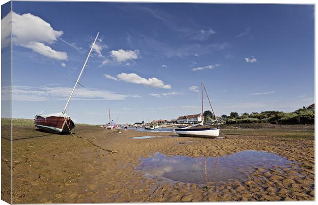 Low Tide in Burnham Overy Staithe Canvas Print by Paul Macro