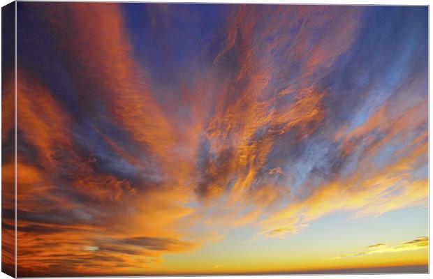 Red clouds Canvas Print by Cristian Mihaila
