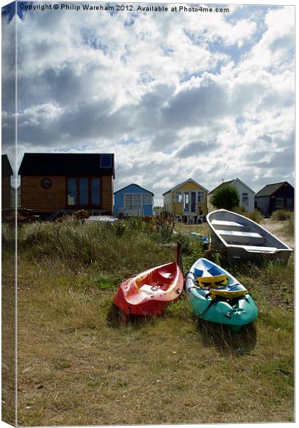 Beach Huts and Boats Canvas Print by Phil Wareham