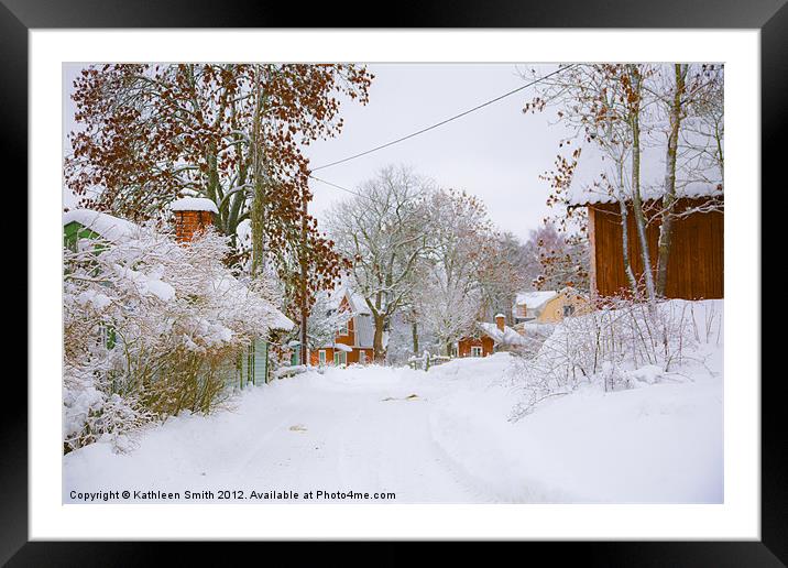 Small village in snow Framed Mounted Print by Kathleen Smith (kbhsphoto)