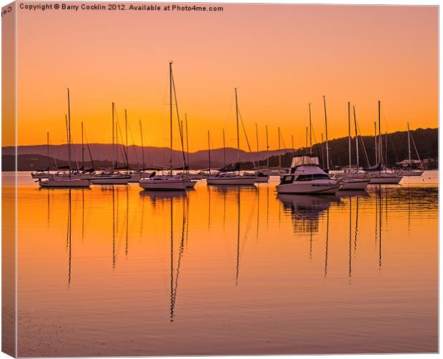 Masts at Sunset Canvas Print by Barry Cocklin