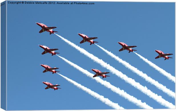 Red Arrows over Kemble Canvas Print by Debbie Metcalfe