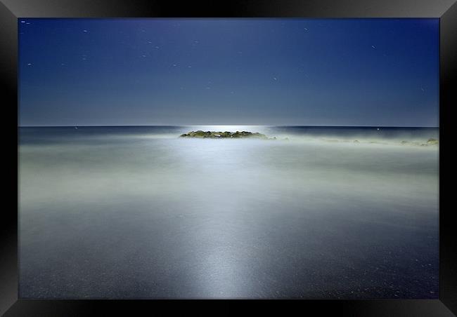 The rock island under de moonlight Framed Print by Guido Montañes