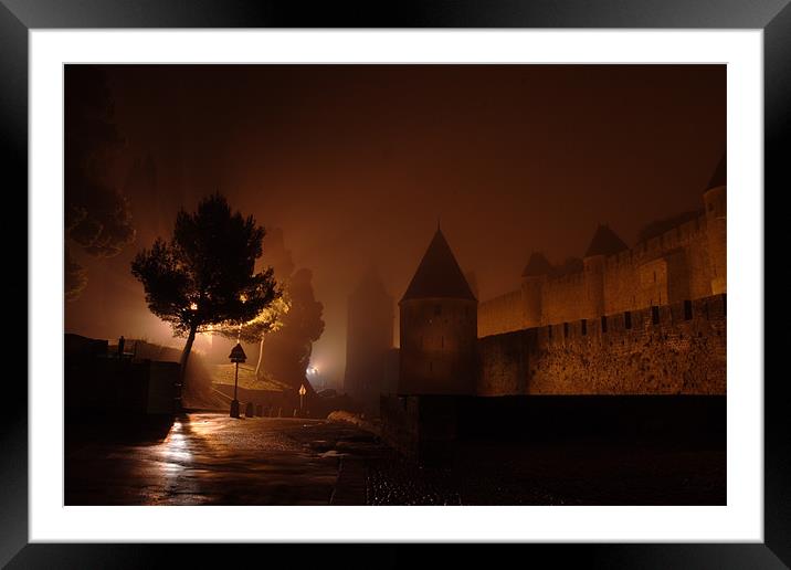Carcasonne in the fog Framed Mounted Print by Gail Johnson