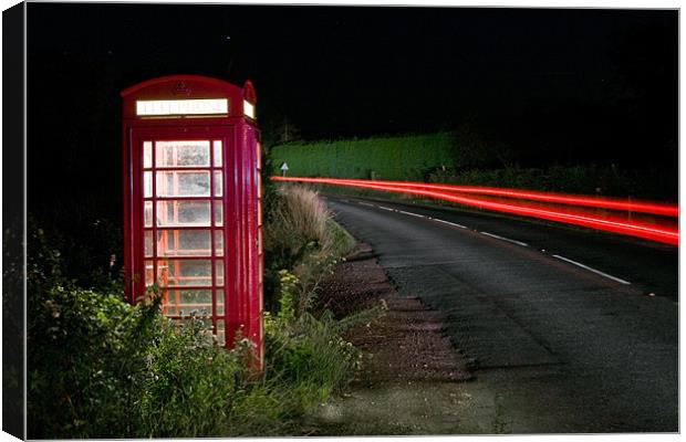Red Phonebox At Night Canvas Print by Malcolm Wood