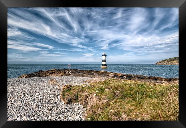 Penmon Point Lighthouse Anglesey Framed Print by Adrian Evans