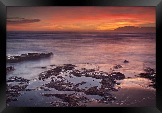SUNSET IN MARBELLA Framed Print by Guido Montañes