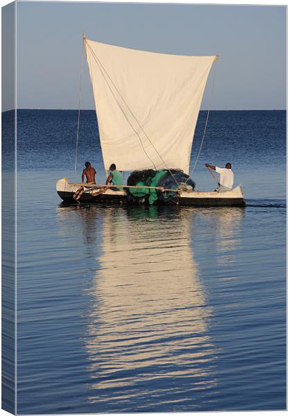 Malagasy fishermen and their outrigger canoes Canvas Print by Gail Johnson