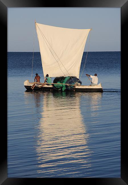 Malagasy fishermen and their outrigger canoes Framed Print by Gail Johnson