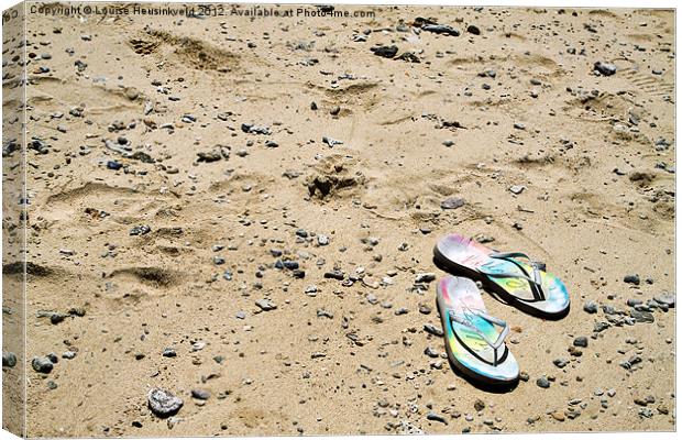 Flipflops on the Beach Canvas Print by Louise Heusinkveld