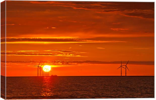 FLAMING RED SKY ( Wind turbines at sea ) Canvas Print by raymond mcbride