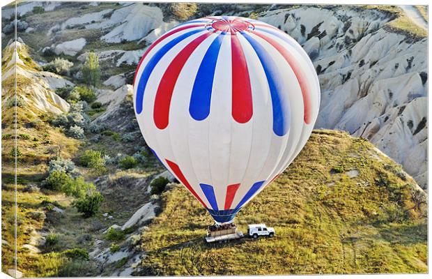Patriotic Coloured balloon lands on trailer Canvas Print by Arfabita  