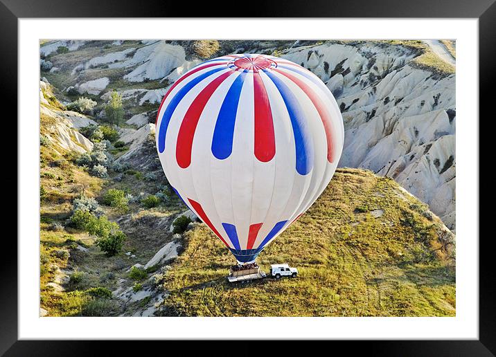 Patriotic Coloured balloon lands on trailer Framed Mounted Print by Arfabita  