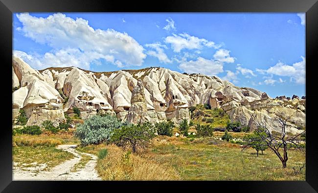 Geology of Cappadocia man lives in Caves Framed Print by Arfabita  