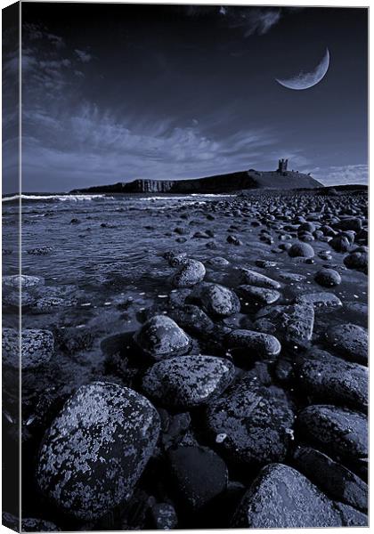 Dunstanburgh Castle with crescent moon Canvas Print by Graham Moore