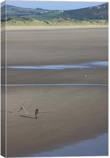 Fishing the beach Canvas Print by Nick Fulford
